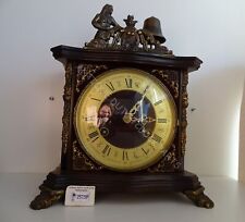 ONE OF A KIND DUTCH 1970S MANTEL CLOCK WITH MAN STRIKING BELL MARKED HOLLANDIA picture