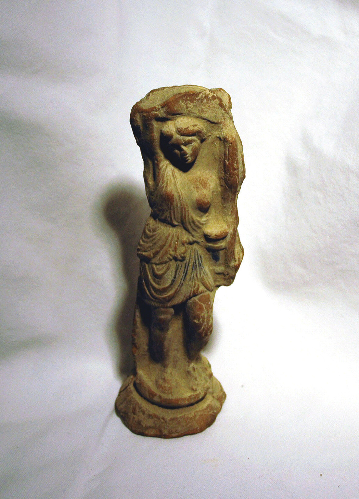 Antique statuette of a wounded Amazon Antique statuette of a wounded Amazon