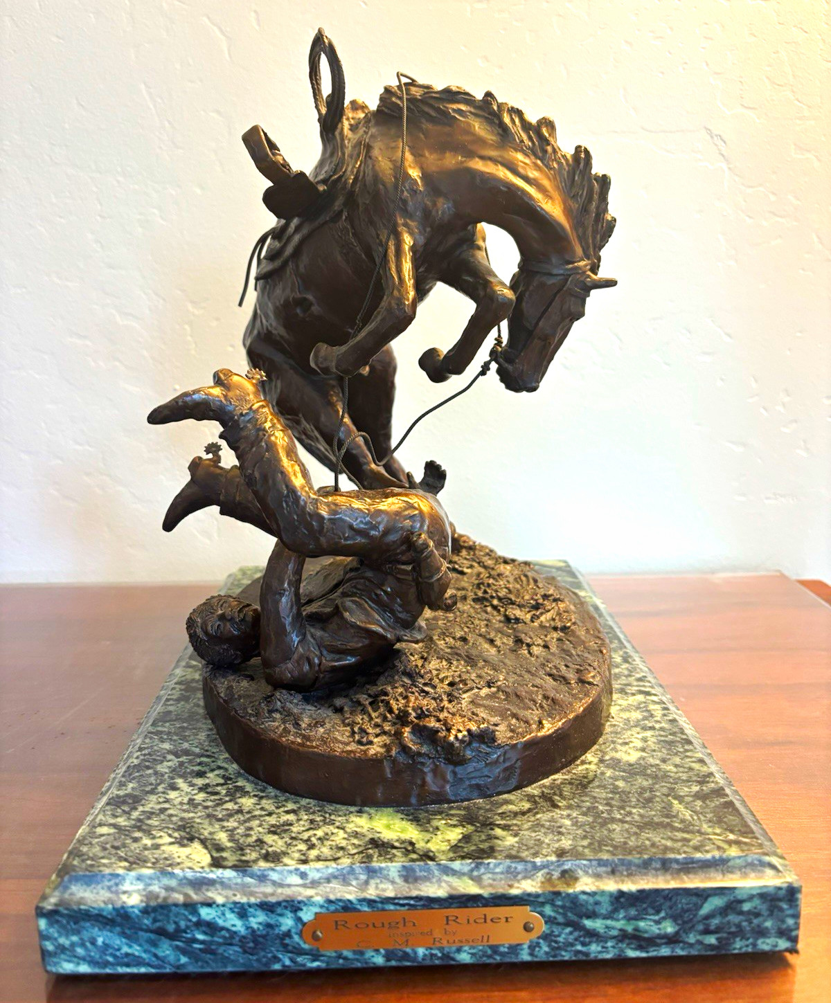 C. M. Russell inspired Bronze Cowboy Sculpture on Marble Base “Rough Rider”