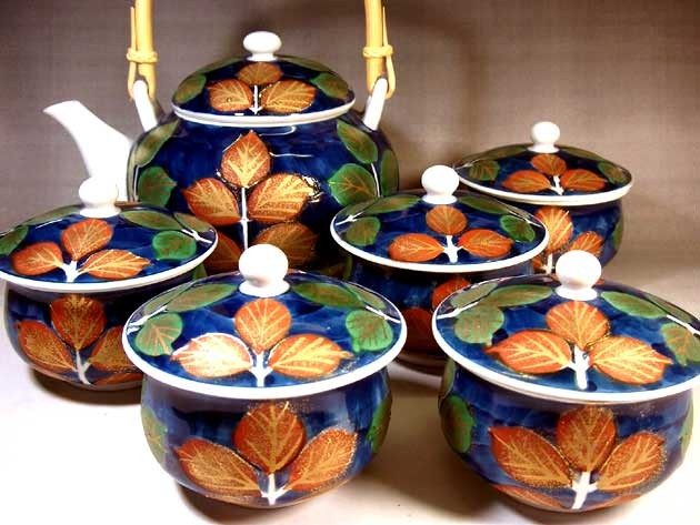 Arita ware tea set with dyed brocade gold leaf design using wood le From Japan