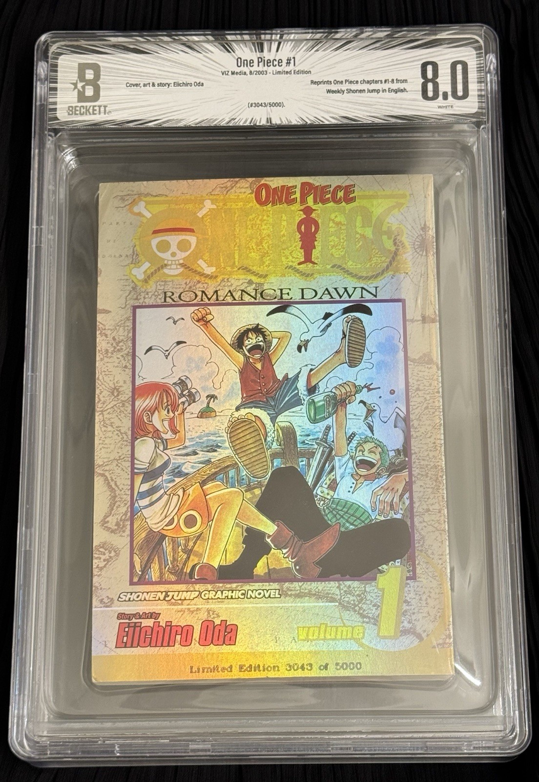 One Piece 8.0 Beckett CBCS Volume 1 Gold Foil Limited Edition 3043/5000 Manga One Piece 8.0 Beckett CBCS Volume 1 Gold Foil Limited Edition 3043/5000 Manga