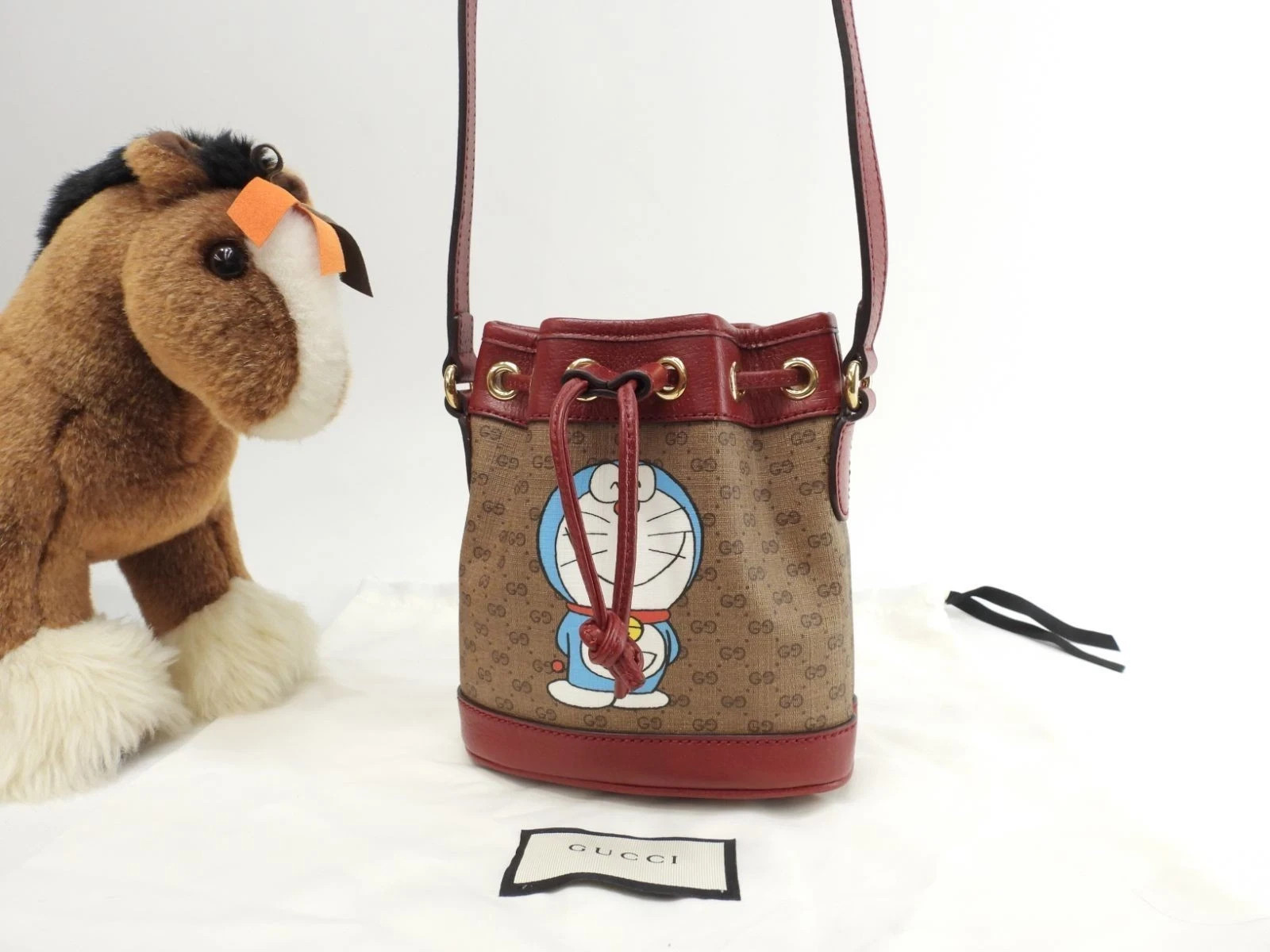 Gucci x Doraemon Micro GG Drawstring Crossbody Bag Brown Red Japan R3dLMT Gucci x Doraemon Micro GG Drawstring Crossbody Bag Brown Red Japan R3dLMT