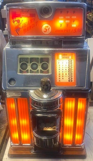 Jennings 5c Amber Lite Up Baby Bandit Slot Machine Hotel Showboat circa 1950's Jennings 5c Amber Lite Up Baby Bandit Slot Machine Hotel Showboat circa 1950's