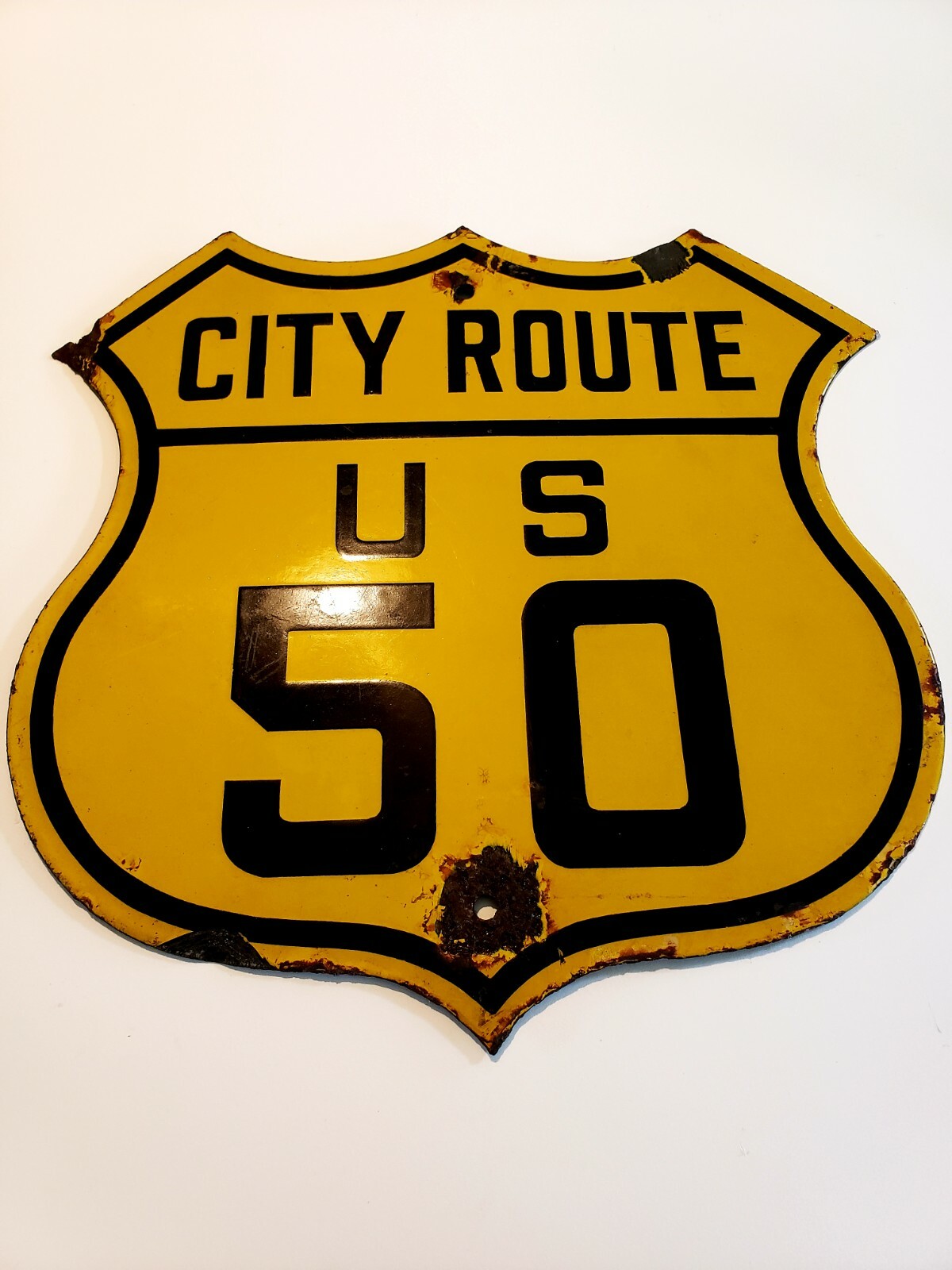 1926 CITY ROUTE US 50 HIGHWAY PORCELAIN SIGN. 1926 CITY ROUTE US 50 HIGHWAY PORCELAIN SIGN.