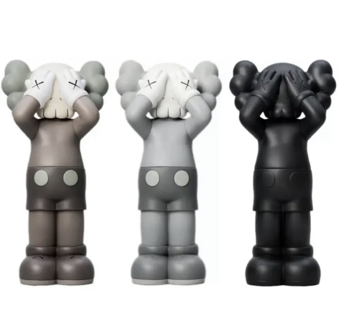 KAWS Holiday UK Vinyl Figure Set of 3 Brown - Grey - Black *Ready to Ship* KAWS Holiday UK Vinyl Figure Set of 3 Brown - Grey - Black *Ready to Ship*