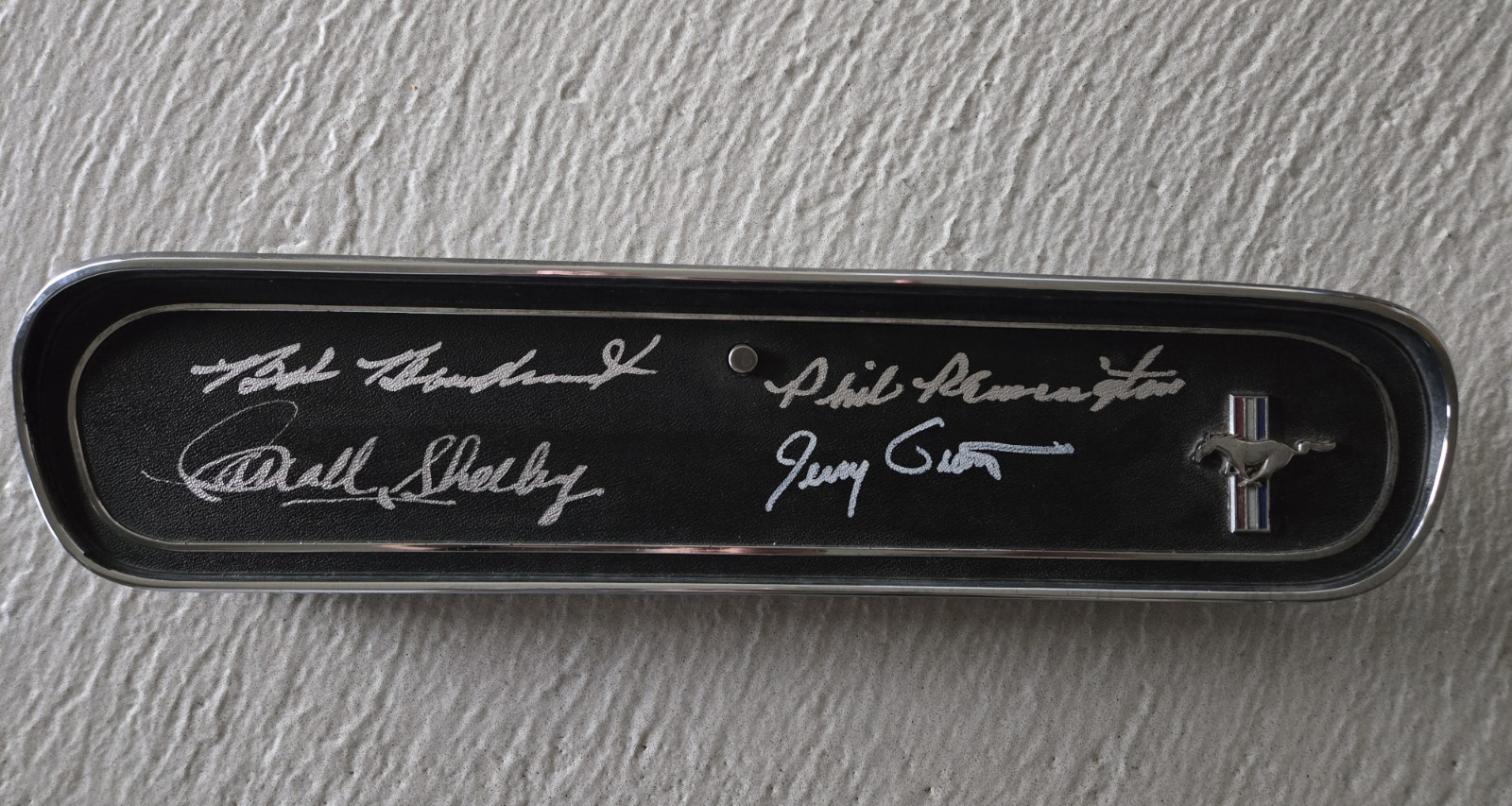 CARROLL SHELBY, Bob Bondurant, Phil Remington and Jerry Grant signed glove box CARROLL SHELBY, Bob Bondurant, Phil Remington and Jerry Grant signed glove box