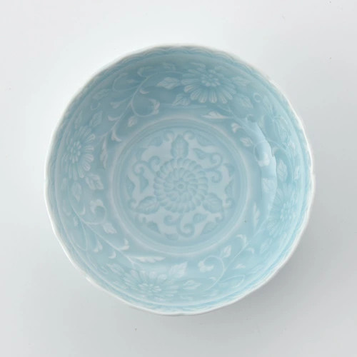 Pale blue celadon with arabesque design small plate made in Japan.  From Japan