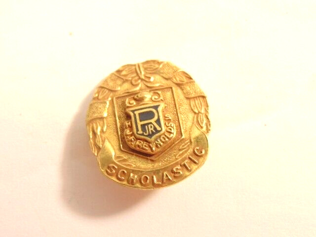 older gold colored J.R. Reynolds High School Scholastic award pin older gold colored J.R. Reynolds High School Scholastic award pin