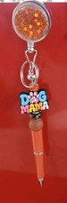 Handmade beaded pen With Retractable Clip. Orange/Dog MAMA picture