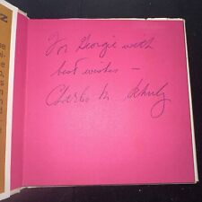 Charles M Schulz Signed Happiness is a Warm Puppy Book - Peanuts, Snoopy - JSA picture