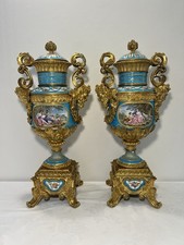An Unusual Shaped Pair of 19th Century French Sevres Style Bronze Mounted Vases picture