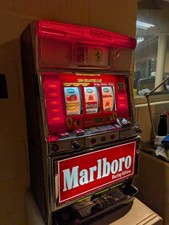 RARE FERRARI MARLBORO VINTAGE TOKEN SLOT MACHINE RACING SCHUMACHER EDITION picture