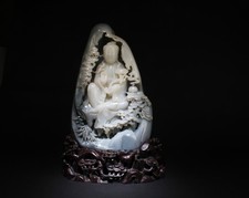 A Massive Carved Hetian Jade Guanyin with Fitted Stand picture