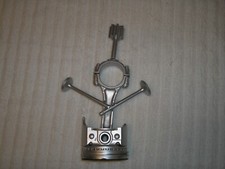 This is a Piston art ornament made from a rod & valve's picture