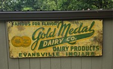 RARE 1930'S GOLD MEDAL DAIRY CO. METAL ADVERTISING SIGN FROM EVANSVILLE, INDIANA picture