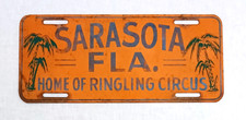 VINTAGE SARASOTA FLORIDA HOME OF RINGLING CIRCUS METAL BOOSTER LICENSE PLATE picture