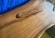 The 8th Wonder of the World The Largest Natural Live Edge Nike Swoosh Table picture