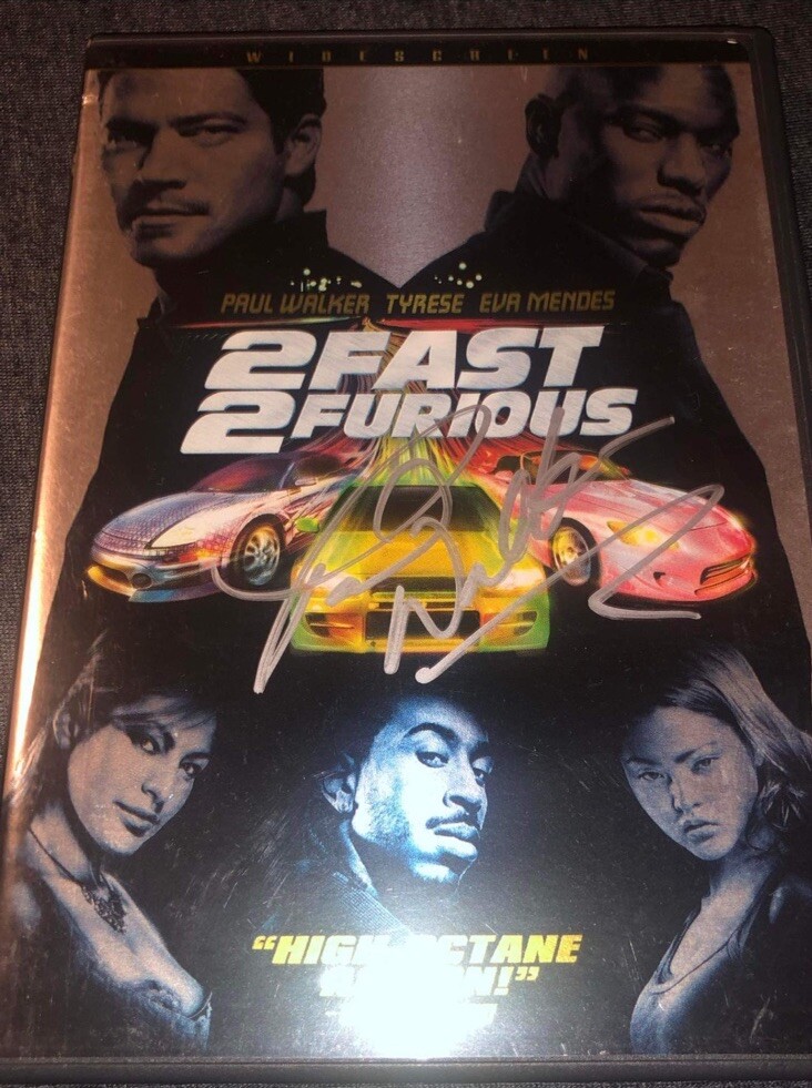 Paul Walker Signed The Fast and the Furious 2Fast 2Furious DVD Cover And Movie Paul Walker Signed The Fast and the Furious 2Fast 2Furious DVD Cover And Movie